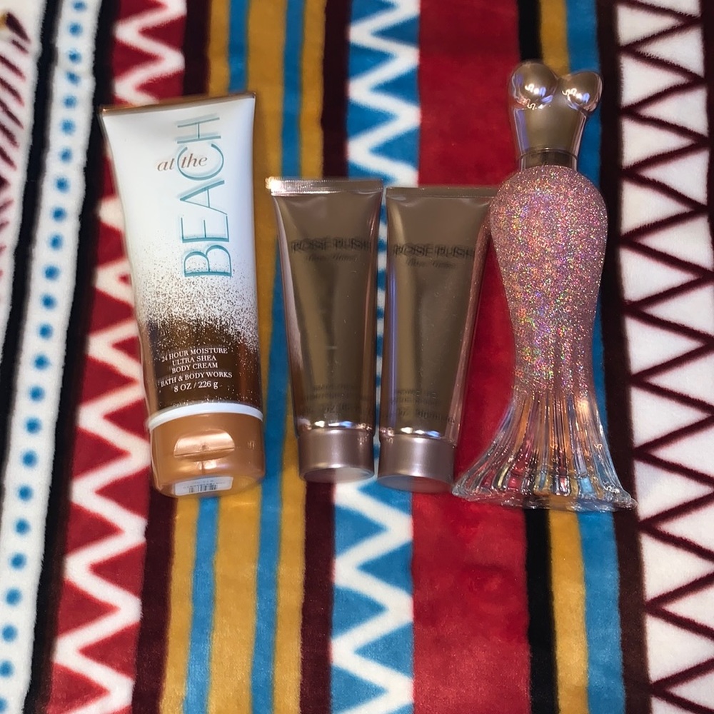 The two rose bottles one is shower gel one is body lotion